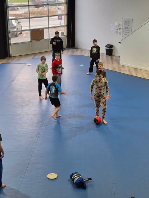 A young student training Jiu-Jitsu after school at Pacific Top Team Kelowna